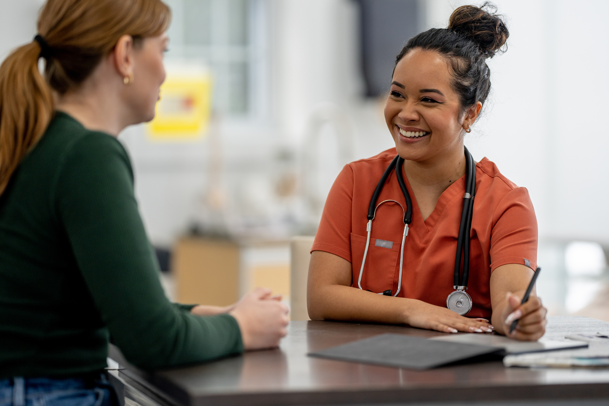 Nurse assisting client
